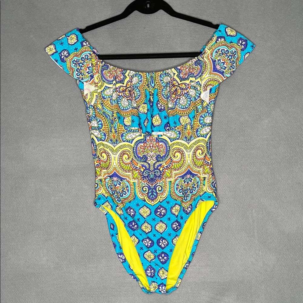 Trina Turk swimsuit with shelf bra and removable pads. Women’s size 8